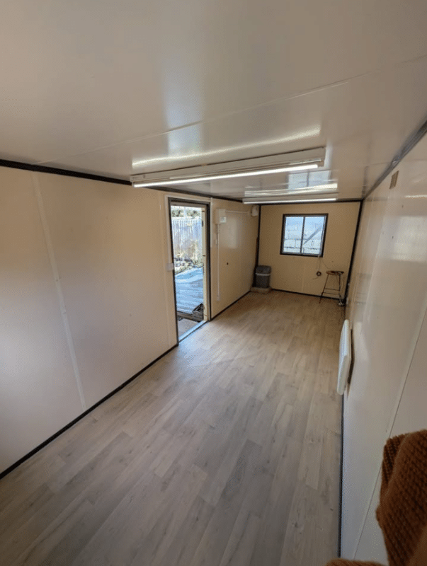 Interior view showing the floor space and heating in the Buckovers unit to rent